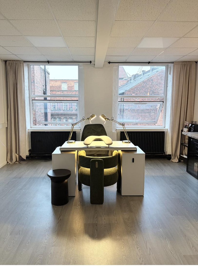 INARU studio desk with natural light beneath original Jewellery Quarter windows